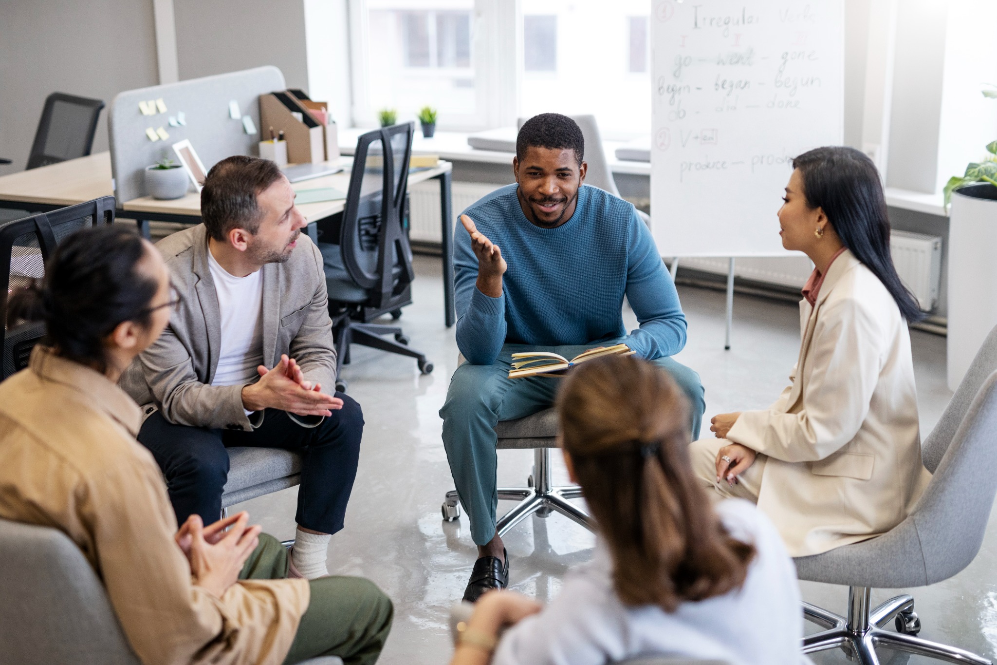 Small group in conversation during a workshop
